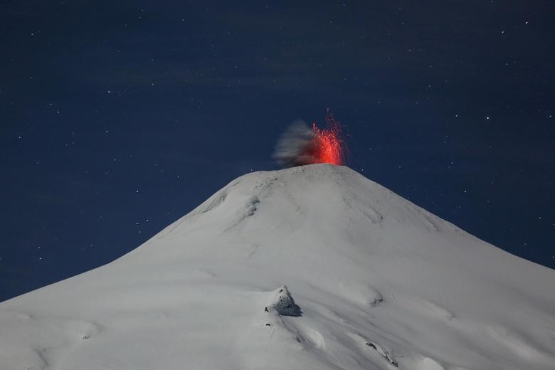 The Villarrica volcano is seen at night from Pucon town, Chile. REUTERS/Cristobal Saavedra Escobar  